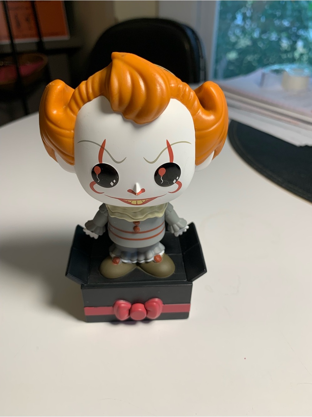 Funko Orange-Head Pennywise Chibi Figure on Black Base